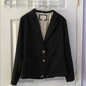 Women’s blazer with gold buttons